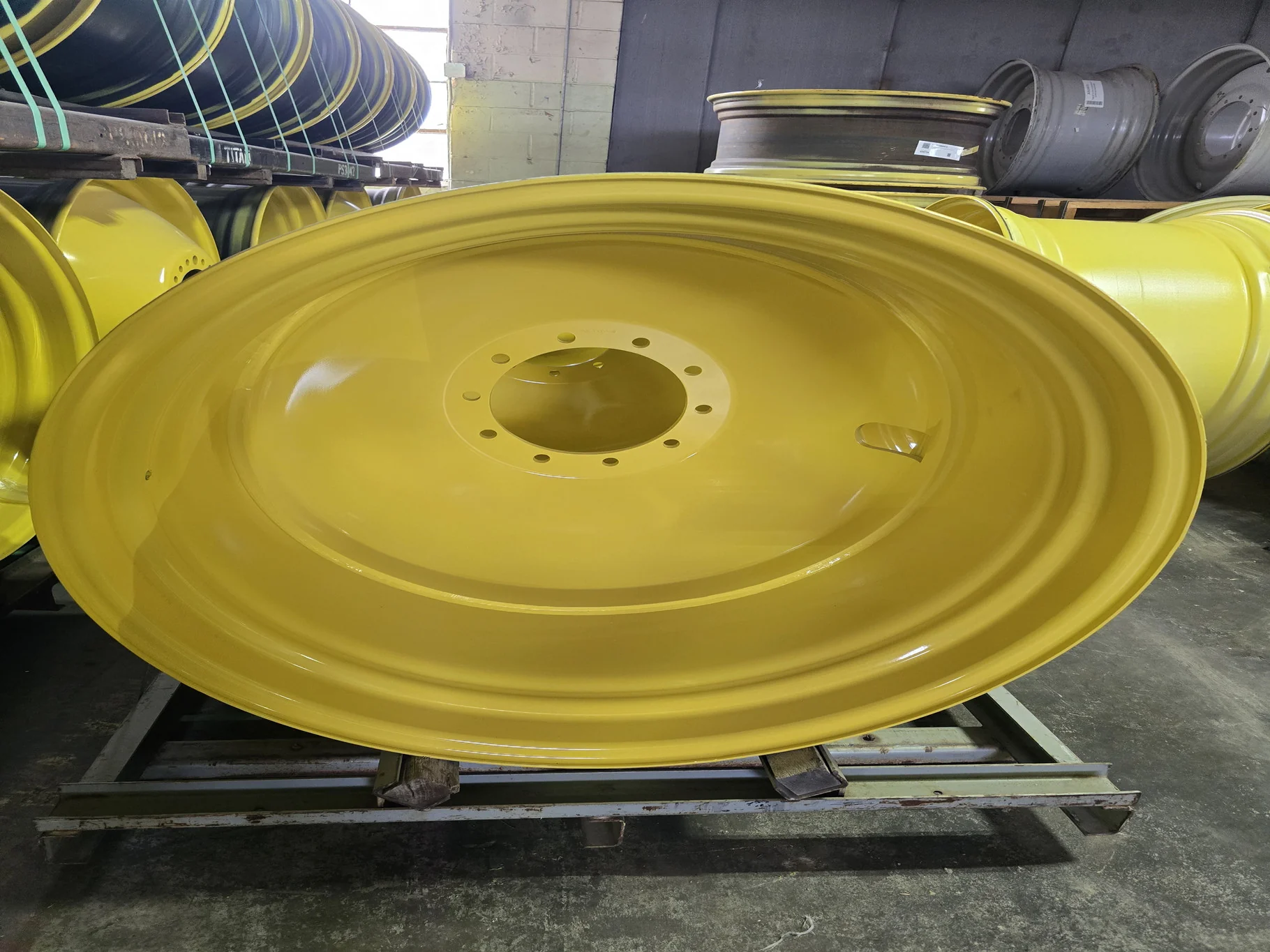 23 X 38 10-13.187-11.07-14.37 (OUTSIDE) HSLA DOLLY DUAL YELLOW WHEEL