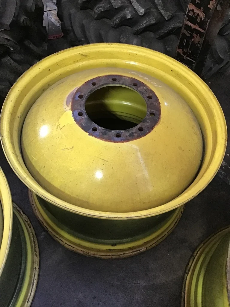 USED 23 X 38 10-13.187-11.09-14.37 OUTSIDE DOLLY DUAL YELLOW WHEEL
