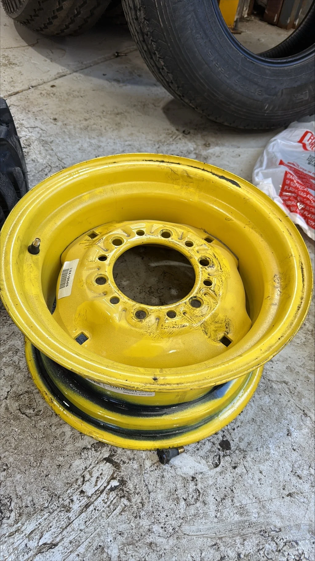 Used 7 X 14 6-6-4.62 JD Yellow Implement Wheel