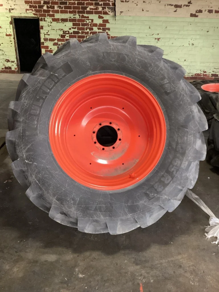 Take-Off 650/65R38 157D Michelin Multibib TL R-1W 95-100% On 20 X 38 8-10.82-8.78 Fendt Red  Wheel