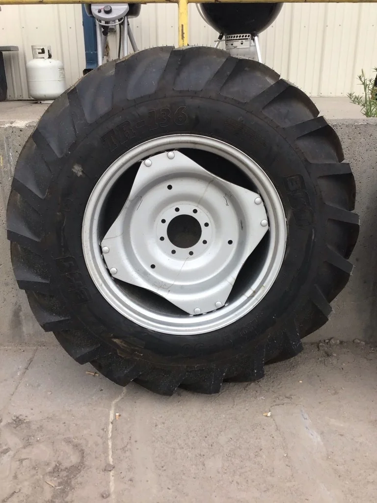 Take-Off 16.9-30 139A8 BKT TR-136 TT R-1W 95-100% On 15 X 30 8-8-6 4/2 Clamp Silver Wheel w/Disc