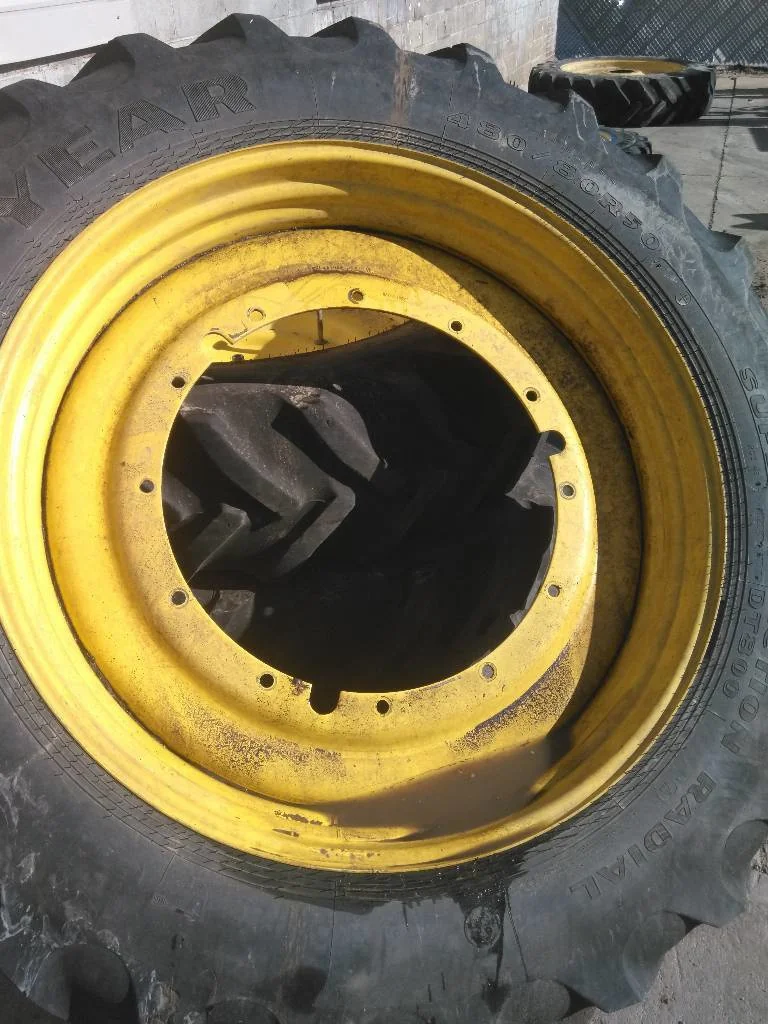 Used 15 x 50 (12-32.047-30.078) John Deere Rim & Rail ( Paint Fair Condition.)