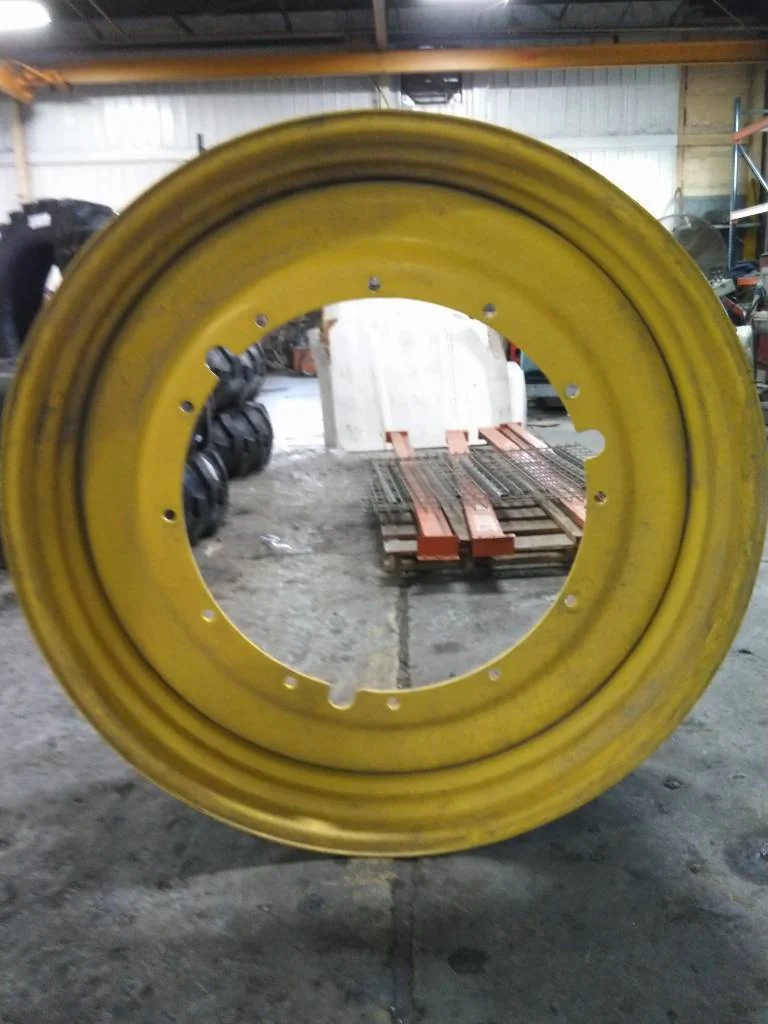 Used 15 x 50 (12-32.047-30.078) Titan John Deere Rim & Rail