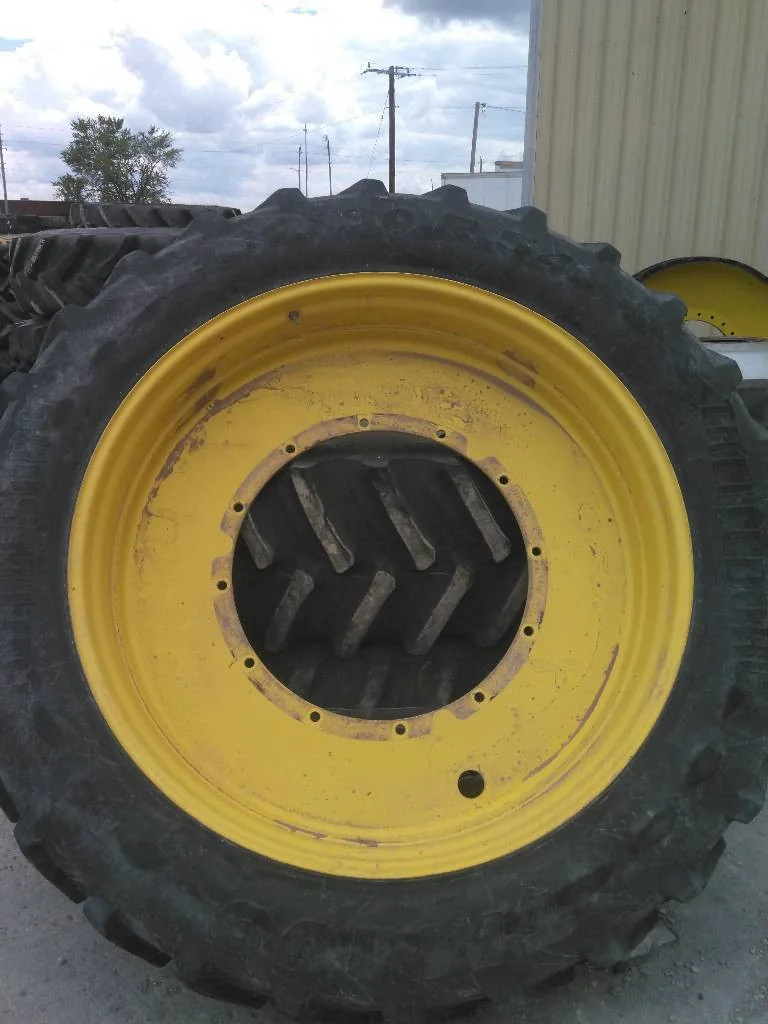 Used 12 x 54 (12-32.047-30.078) John Deere Rim & Rail Wheel