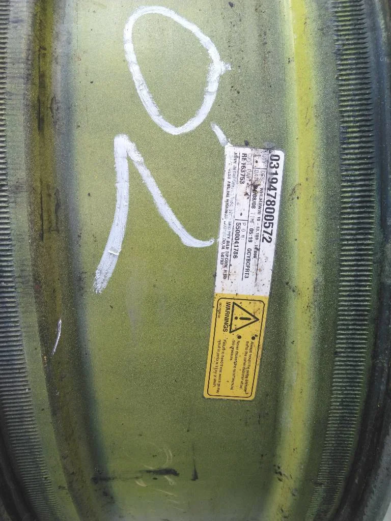 Used 10 x 34 (10-13.19-11.07) Titan Waffle 3 Bolt/Disc John Deere (Rusty, Scratches, Faded Paint)