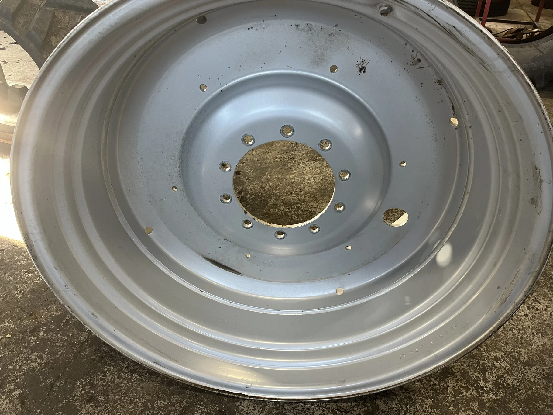 Used 23 X 42 10-13.19-11.07 Dual Silver Wheel image 2