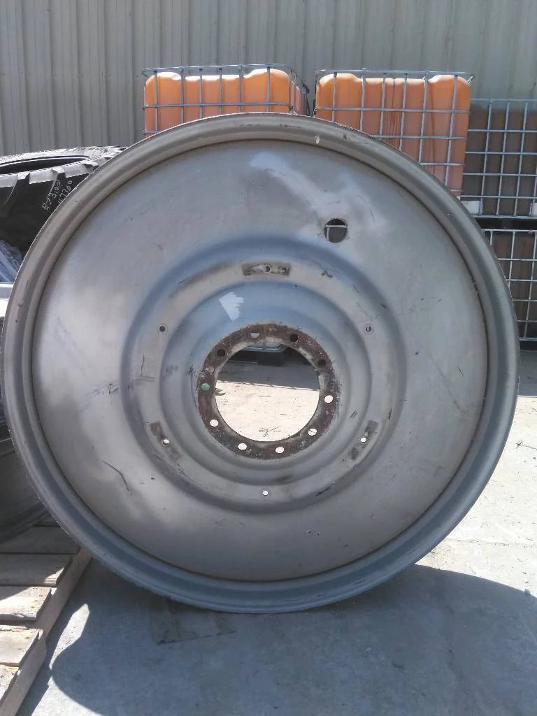 Used 12 x 54 (10-13.19-11.07) Titan Case Silver Dual Wheel (Scratches Faded Paint)