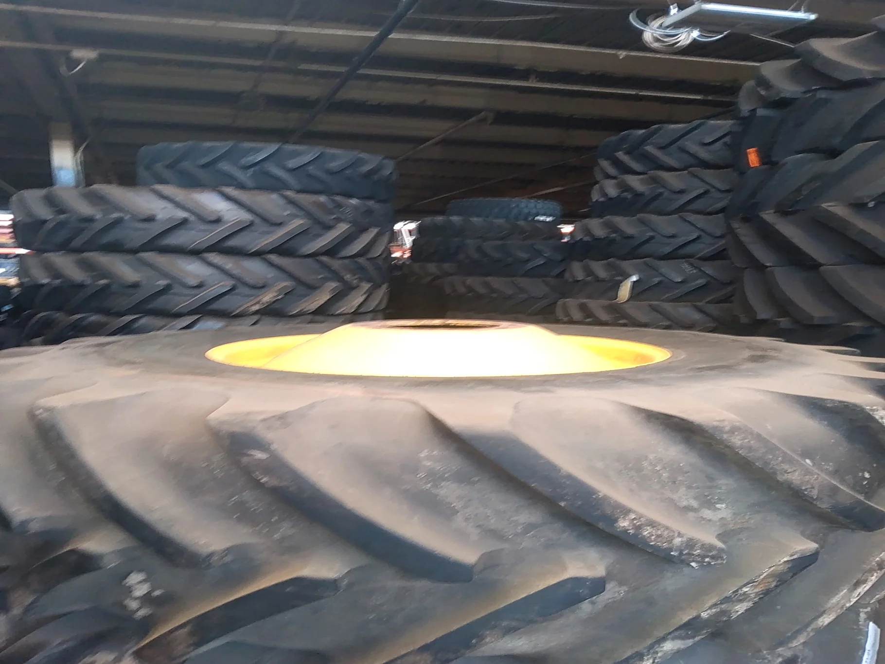 Used 650/85R38 173A8 Michelin MachXbib TL R-1W 90-95% on 23 X 38 10-13.19-11.07-15.56 Dolly Dual Yel