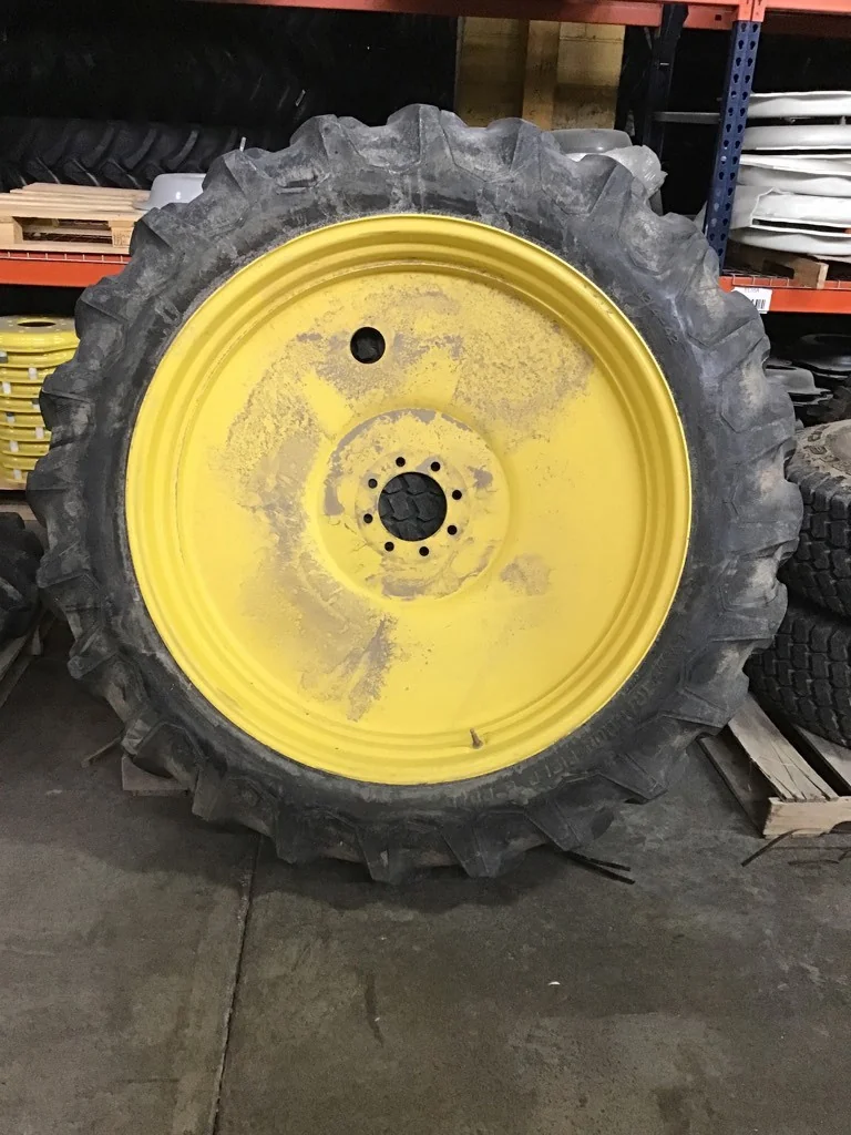 Used 12.4-42/10 Firestone Traction Field & Road TL R-1 80-85% on 10 X 42 GKN 8-8-6.0-8.812FS Yellow image 2
