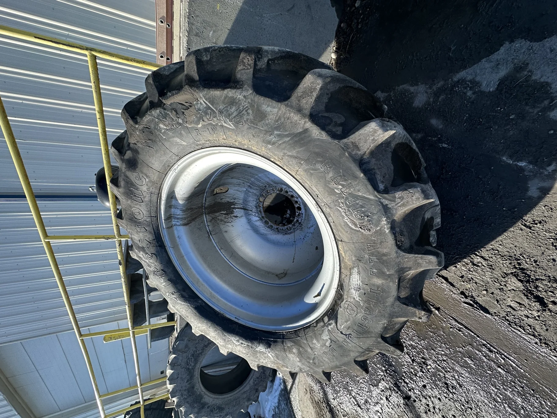 Used 620/70R42 Firestone Radial All Traction Deep Tread R-1W (160B) TL 85%  on a 18 x 42 Case Silver