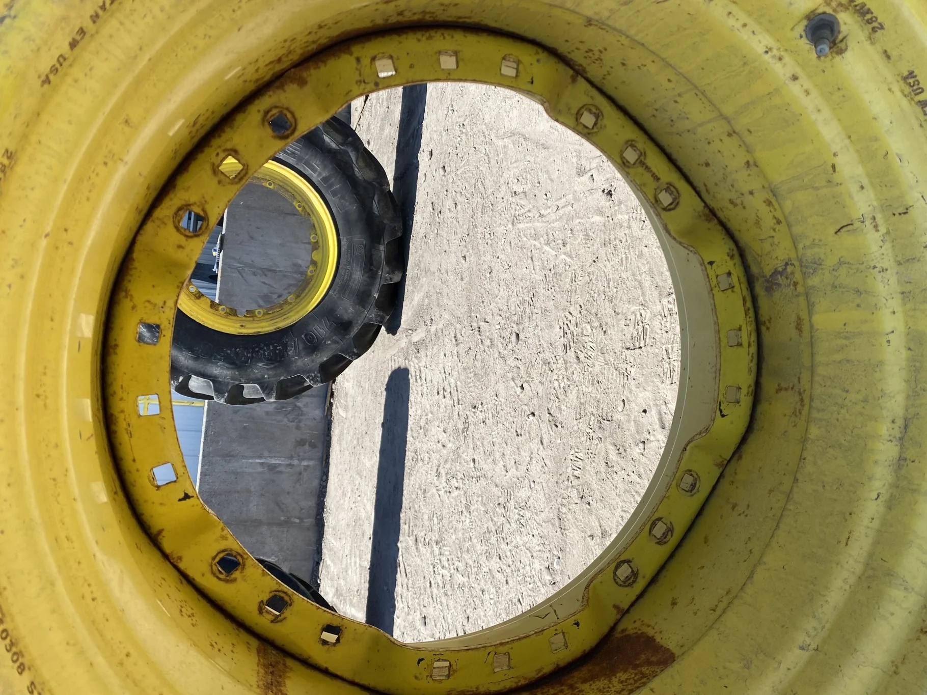 Used 600/65R28 Michelin XM28 TL 67% on a 18 x 28 JD Yellow Waffle Wheel (3 Bolt) 4" offset   ( image 3