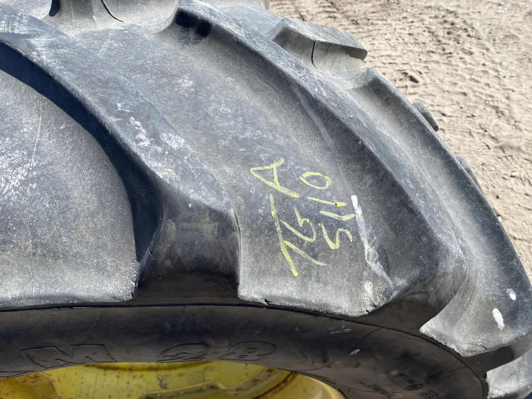 Used 600/65R28 Michelin XM28 TL 67% on a 18 x 28 JD Yellow Waffle Wheel (3 Bolt) 4" offset   ( image 6