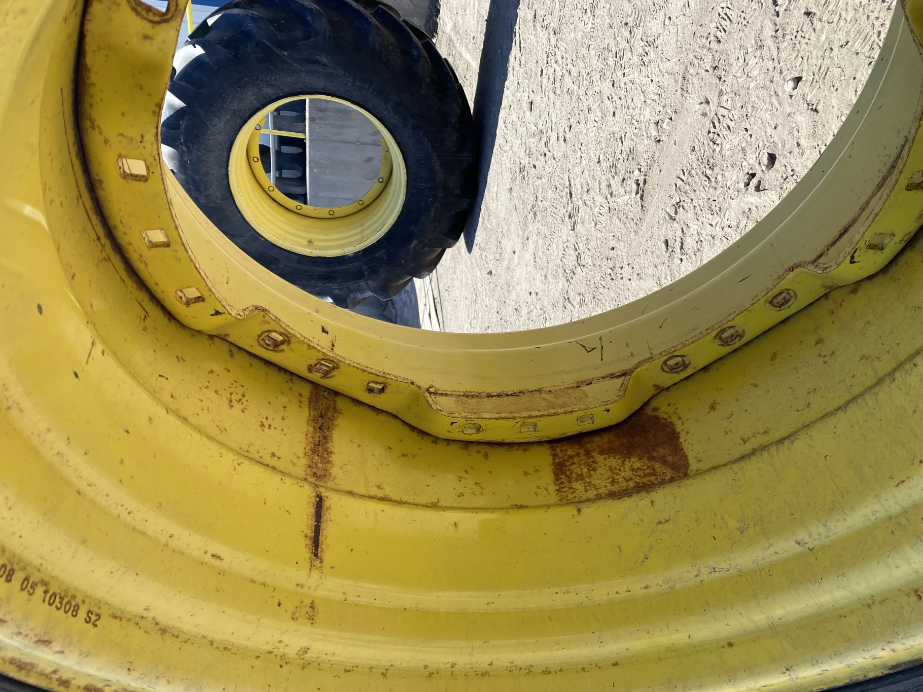 Used 600/65R28 Michelin XM28 TL 67% on a 18 x 28 JD Yellow Waffle Wheel (3 Bolt) 4" offset   ( image 9