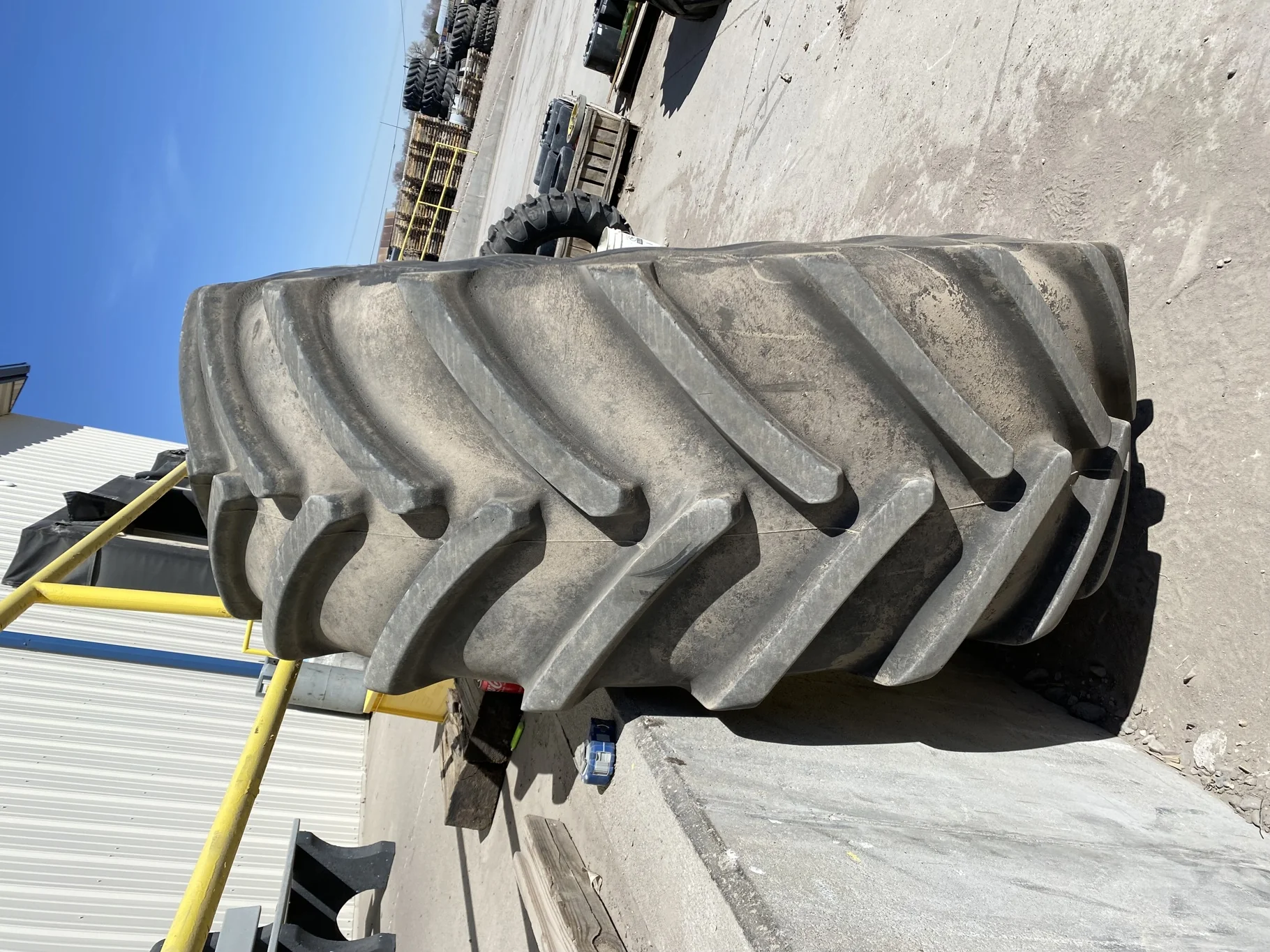Used 93% IF710/70R42 Firestone Maxi Traction R-1W (179D) TL on a 23 x 42 JD Yellow 12-32.04-30.07 image 2