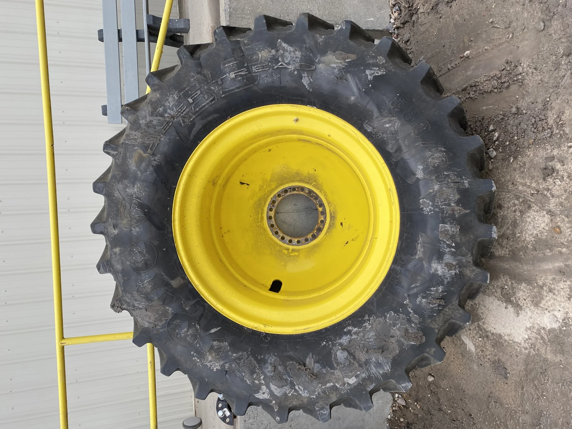 Used 580/85R42 Firestone Radial Deep Tread 23 R-1W (166B) TL 85% on a 18 x 42 JD Yellow 20 B Inside image 2
