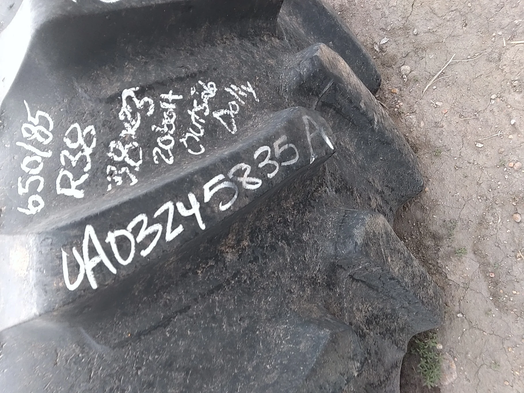 Used 650/85R38 Firestone Radial Deep Tread 23 R-1W 173B TL 85% on 23 X 38 JD Yellow 20B Outside