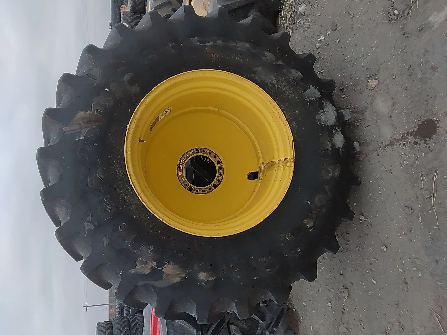 Used 650/85R38 Firestone Radial Deep Tread 23 R-1W 173B TL 85% on 23 X 38 JD Yellow 20B Outside image 2