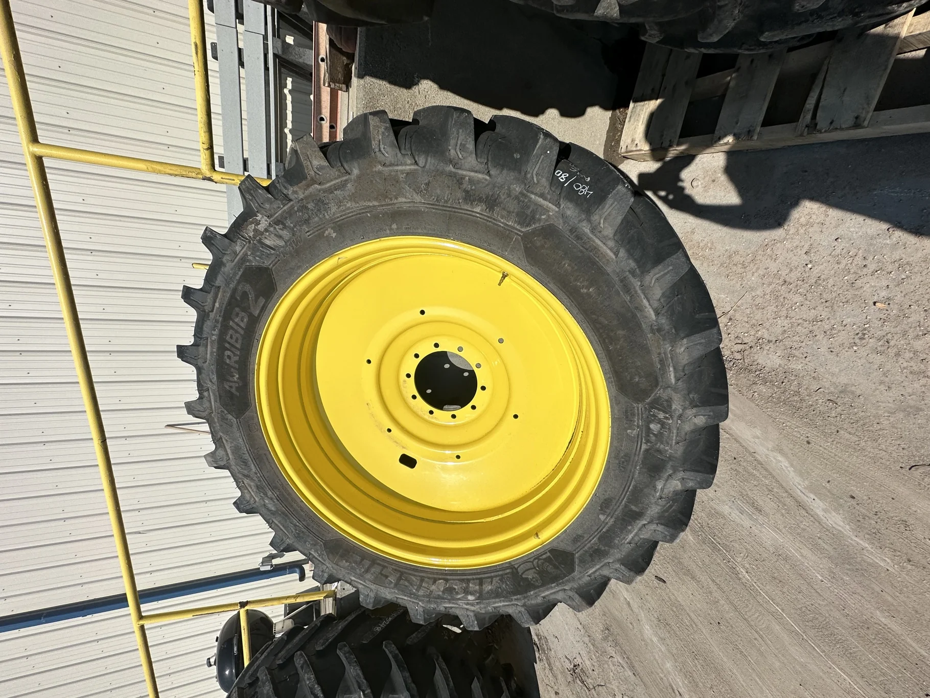 USED 480/80R46 Michelin AgriBib 2 R-1W (158A8/158B) TL 85% on a 16 X 46 JD Yellow 10 Bolt Dual