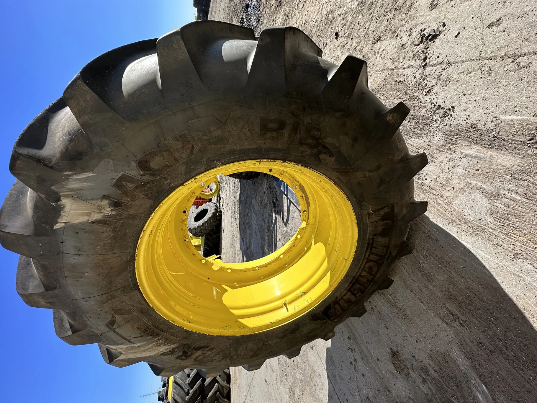 Used 710/70R42 Michelin MachXBib R-1W 173D TL 80% on a 23 x 42 JD Yellow 12 Bolt (.945) Stub D