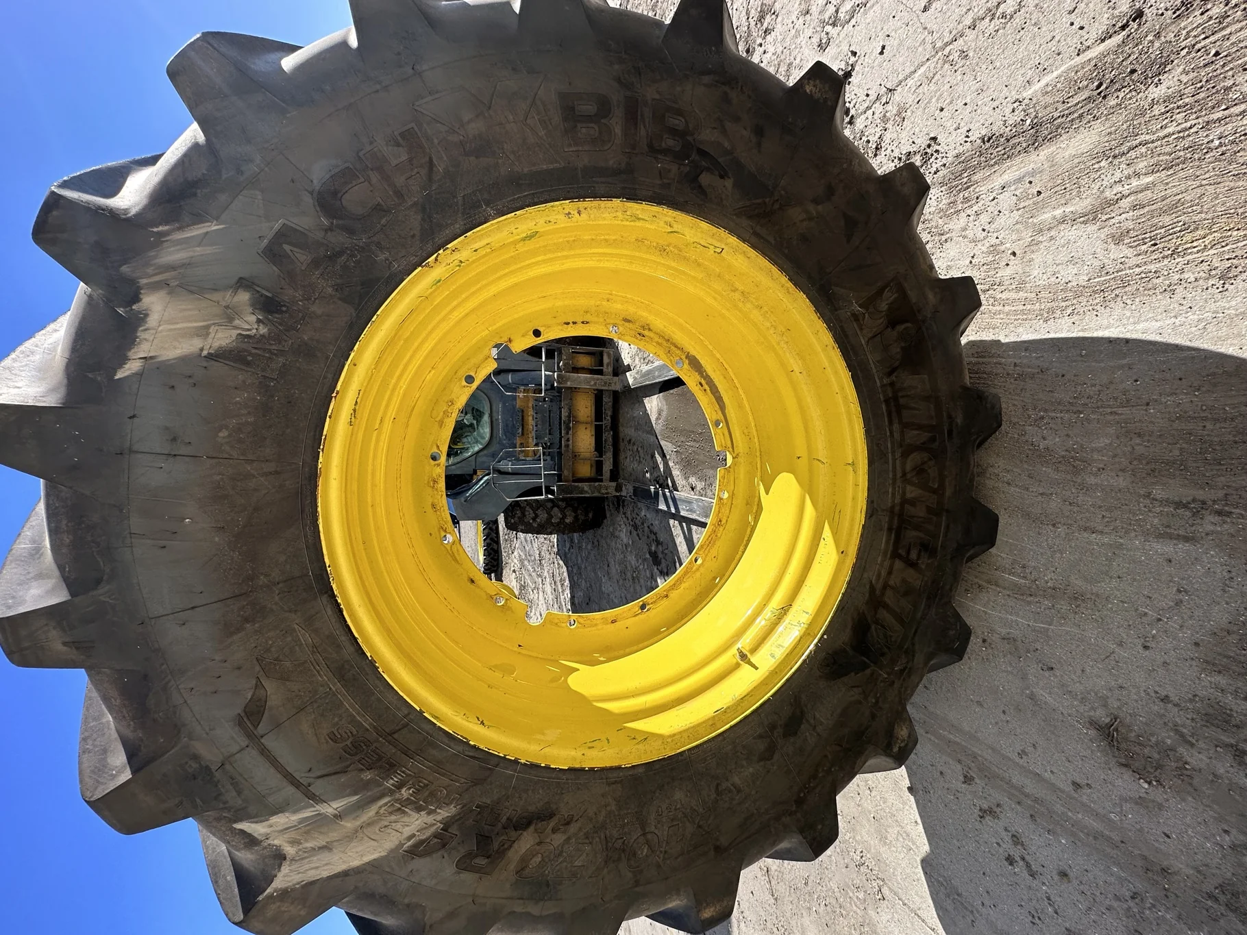 Used 710/70R42 Michelin MachXBib R-1W 173D TL 80% on a 23 x 42 JD Yellow 12 Bolt (.945) Stub D image 2