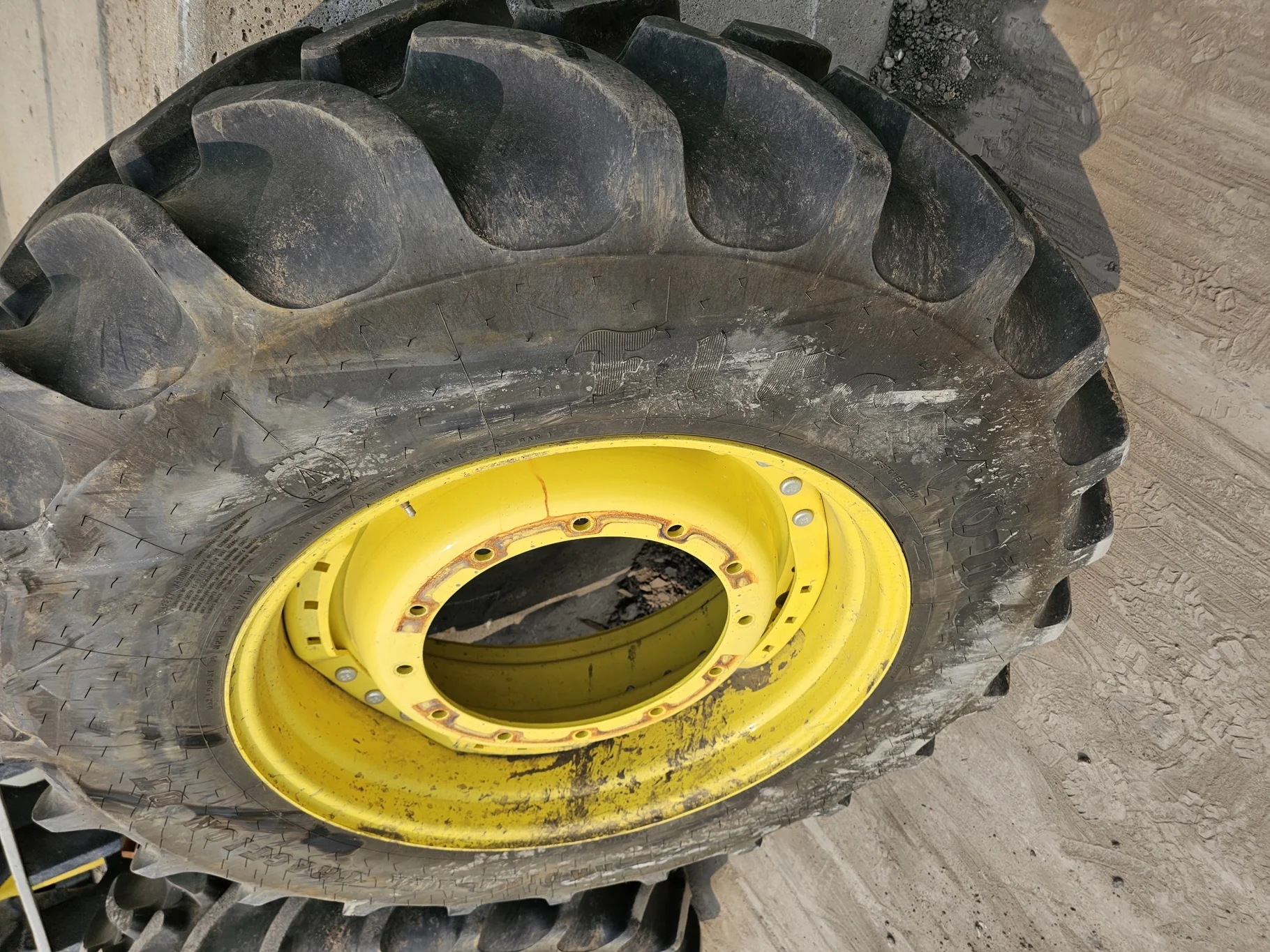 USED 420/85R34 Firestone Radial All Traction DT R-1W (147B) TL 98% on a 15 X 34 JD Yellow Waff