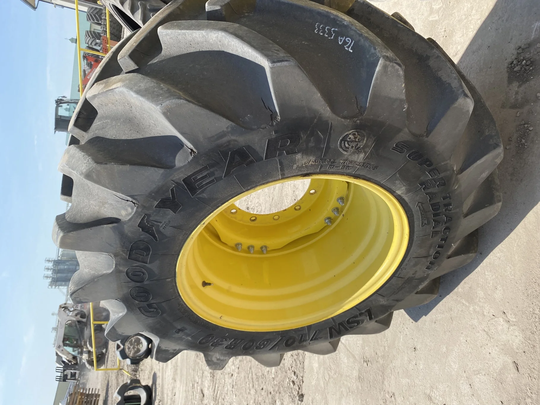 Used LSW 710/60R30 Goodyear Super Traction Radial (177D) 85% mounted on 25 x 30 JD Yellow 12 B