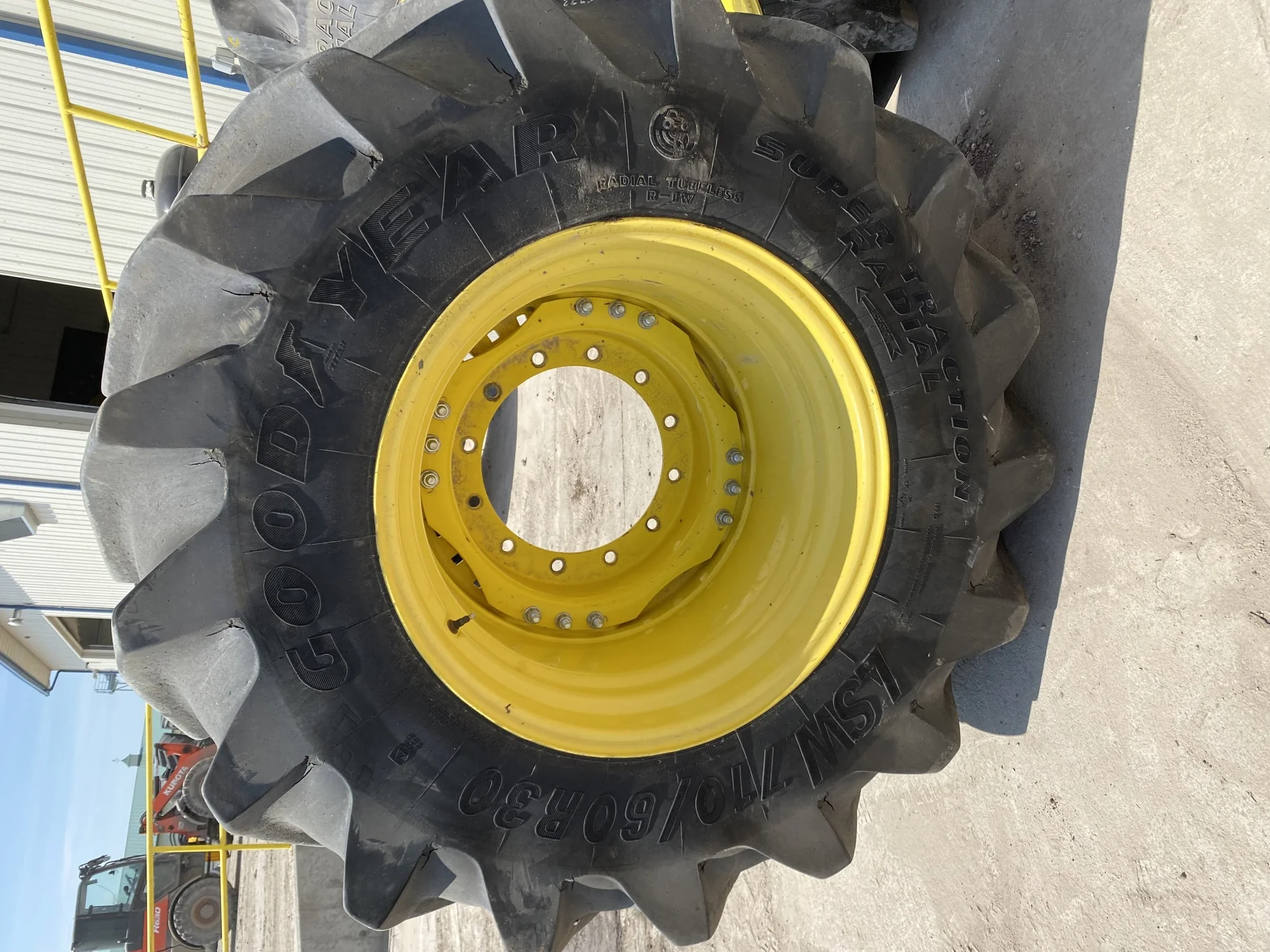 Used LSW 710/60R30 Goodyear Super Traction Radial (177D) 85% mounted on 25 x 30 JD Yellow 12 B image 2