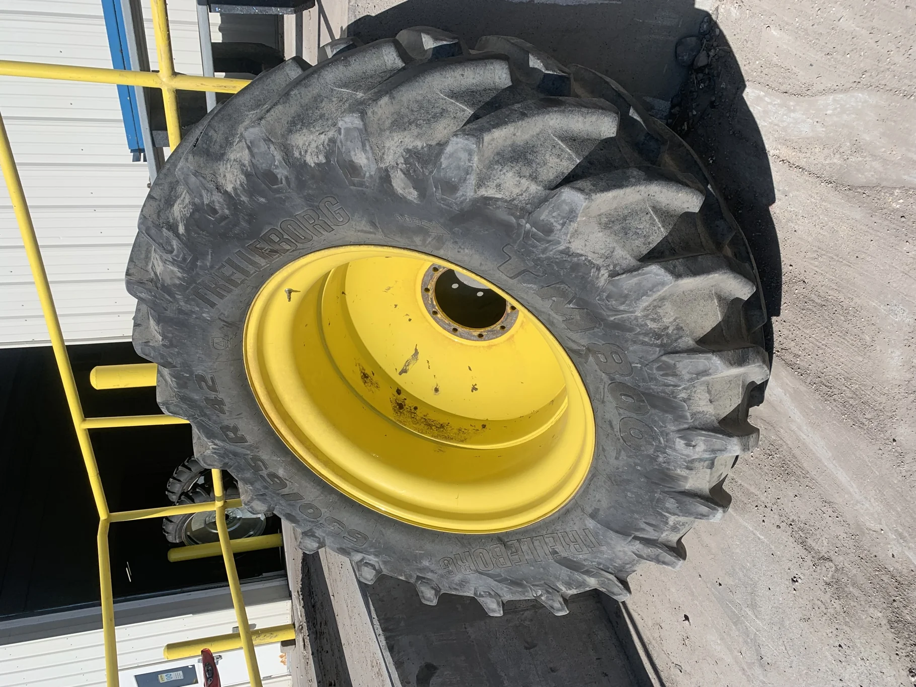 Used 650/65R42 Trelleborg TM800 High Speed R-1W (158D) TL 75% on a 18 x 42 JD Yellow10 Bolt (.