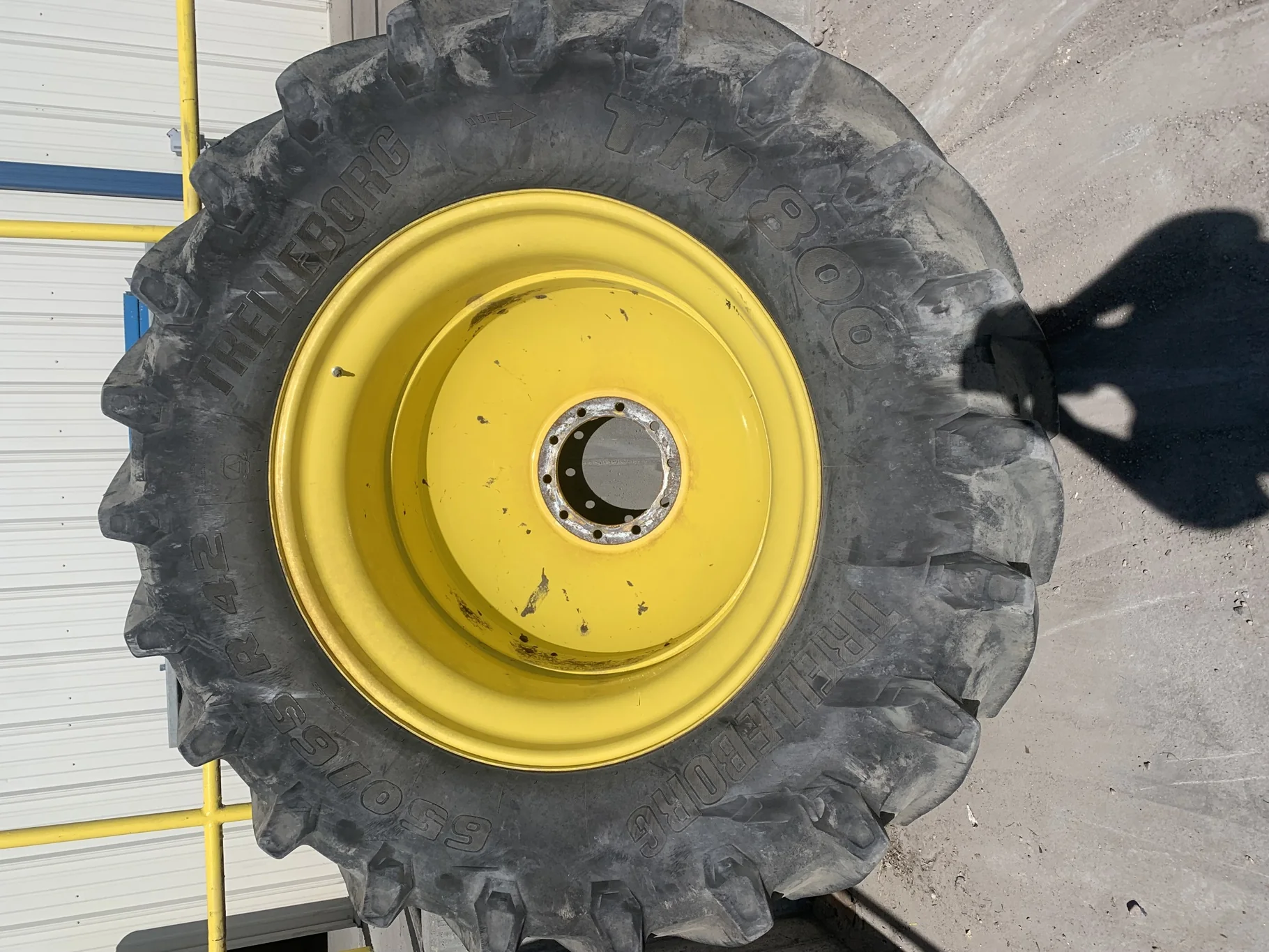Used 650/65R42 Trelleborg TM800 High Speed R-1W (158D) TL 75% on a 18 x 42 JD Yellow10 Bolt (. image 2