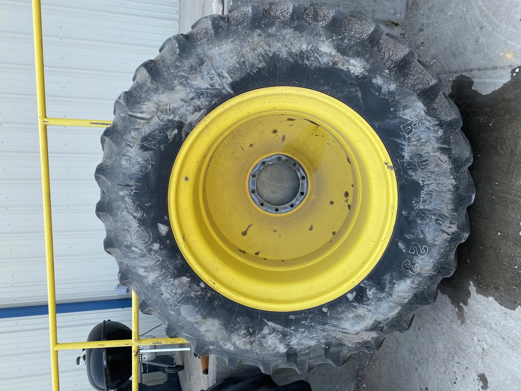 Used 20.8R42 Firestone 23 55% on a 18 x 42 JD Yellow 10 Bolt Inside Dolly Dual   (Lug Cuts, We