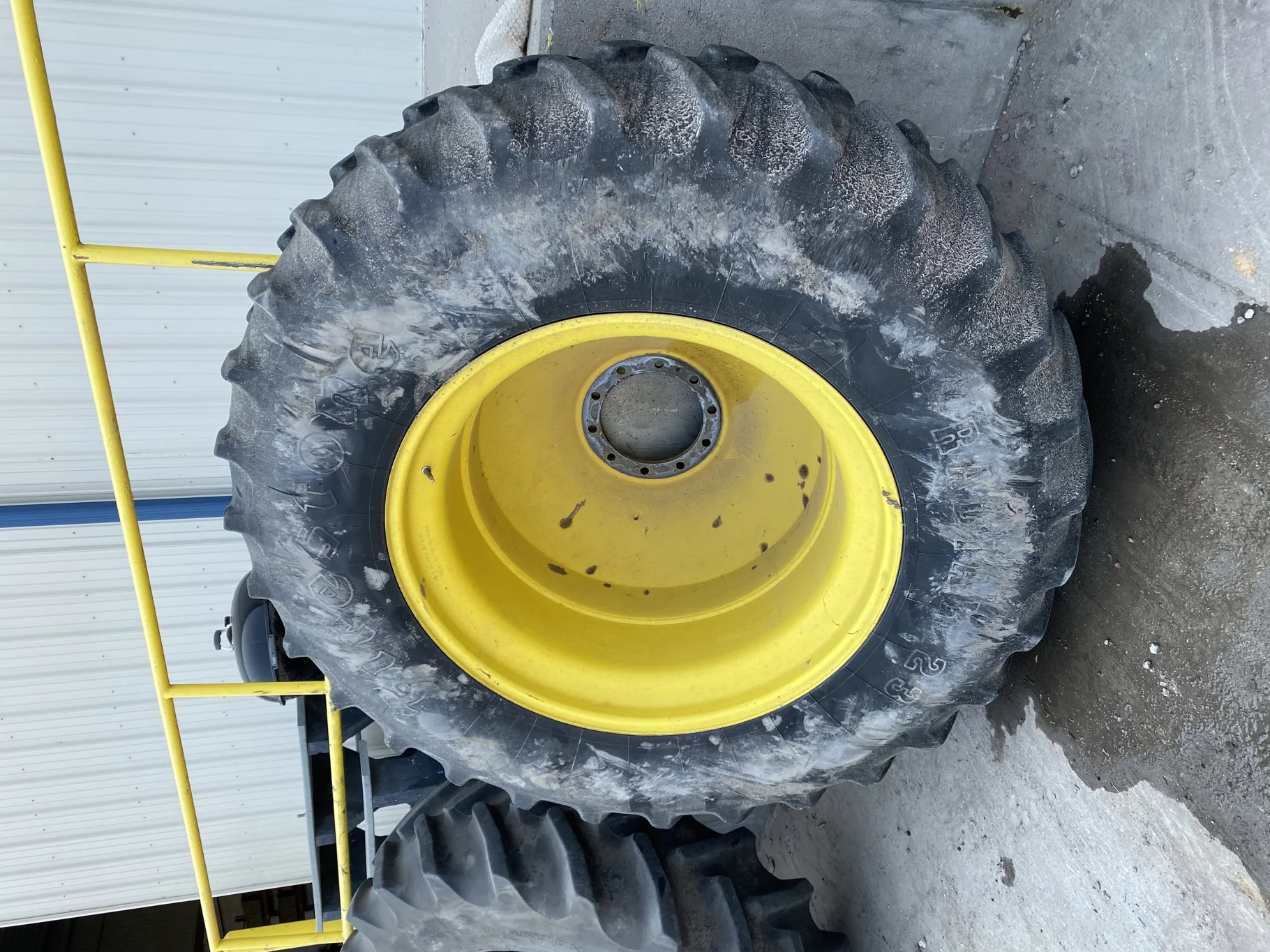 Used 20.8R42 Firestone 23 55% on a 18 x 42 JD Yellow 10 Bolt Inside Dolly Dual   (Lug Cuts, We image 2