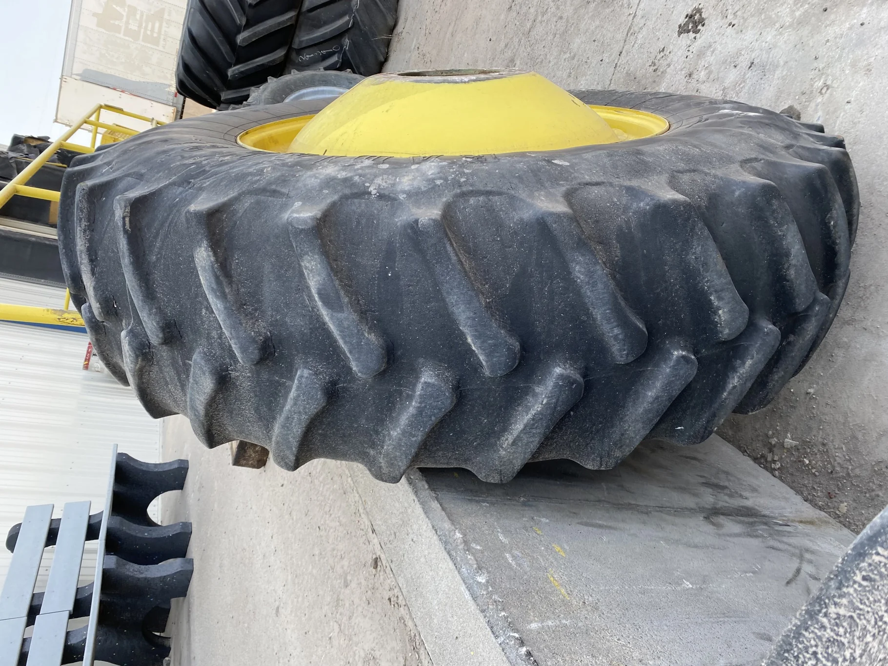 Used 20.8R42 Firestone 23 55% on a 18 x 42 JD Yellow 10 Bolt Inside Dolly Dual   (Lug Cuts, We image 4
