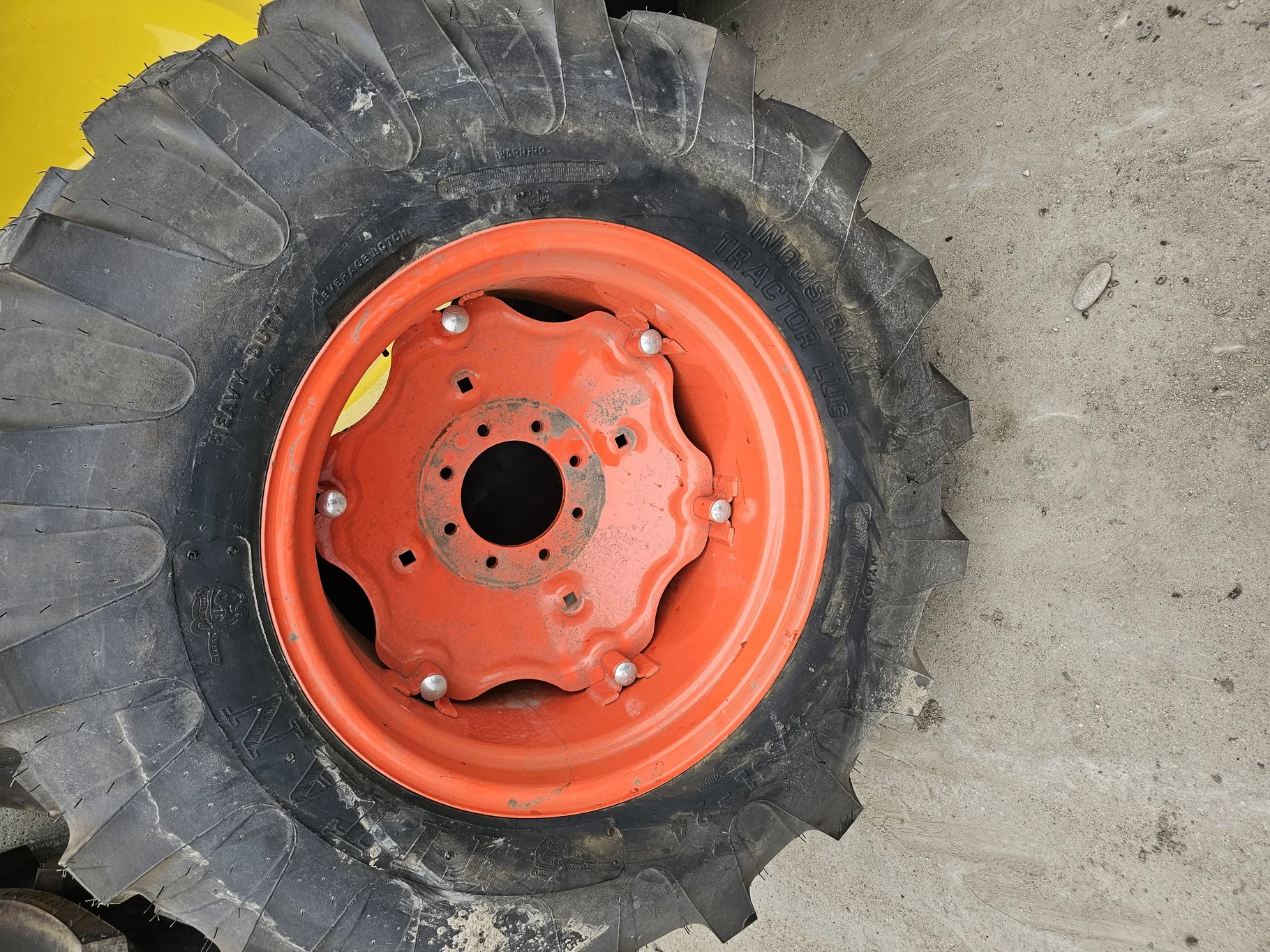 Take-Off 17.5L-24 Titan Industrial Tractor Lug R-4 8Ply TL on a 15 X 24 Kubota Orange 6 Loop Wheel image 2