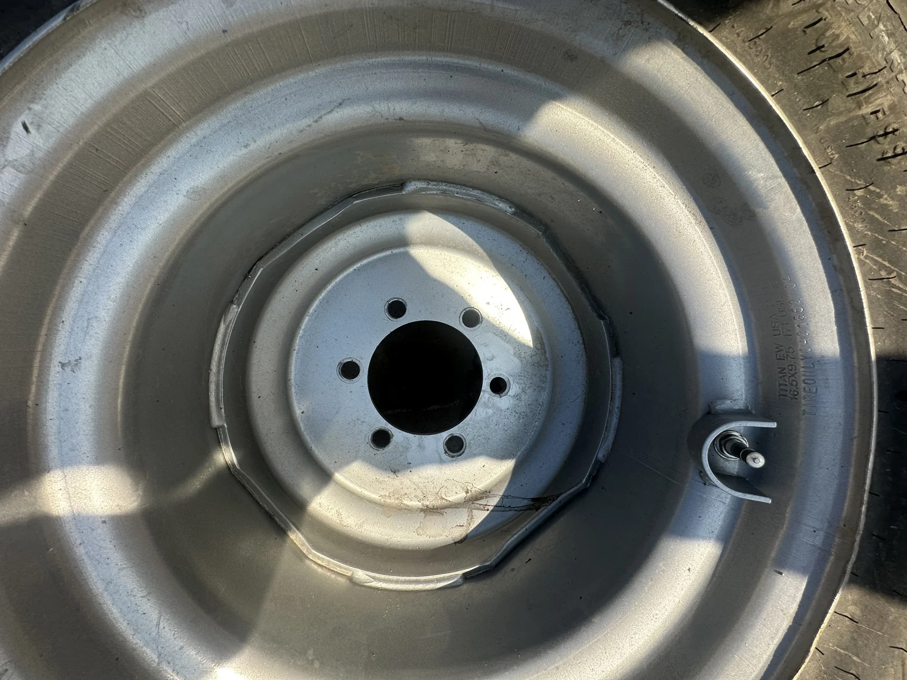 USED 12-16.5 Titan Trac Loader NHS C(6Ply) TL 95% on a 9.75 X 16.5 Silver Mist 6 Bolt Imp Wheel image 3