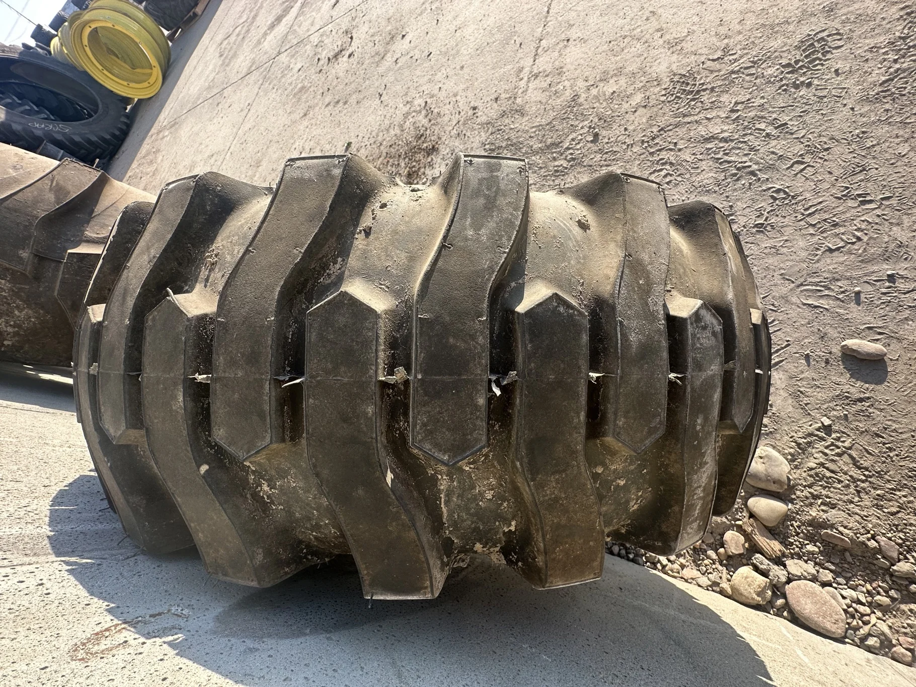 USED 12-16.5 Titan Trac Loader NHS C(6Ply) TL 95% on a 9.75 X 16.5 Silver Mist 6 Bolt Imp Wheel image 4