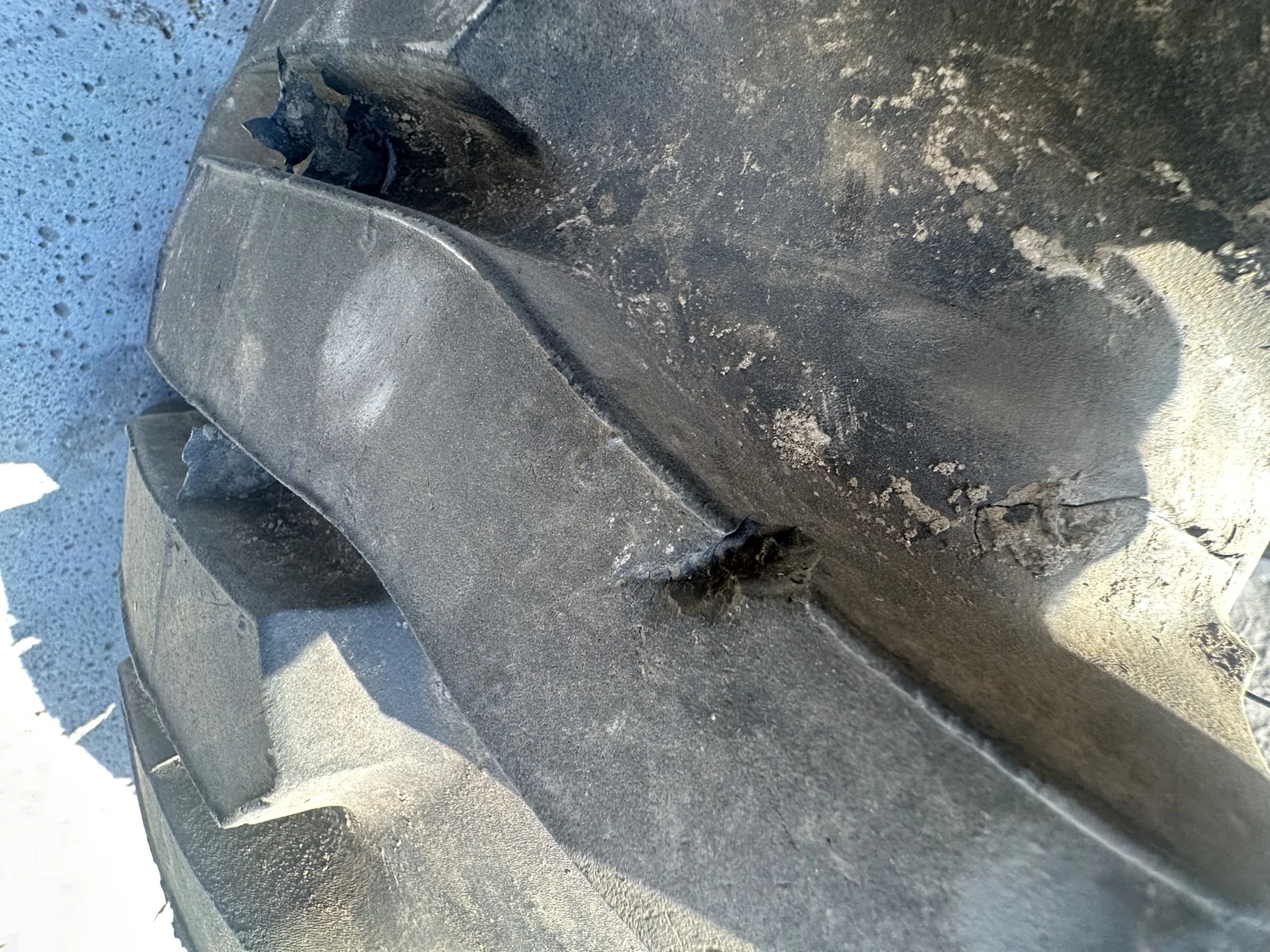 USED 12-16.5 Titan Trac Loader NHS C(6Ply) TL 95% on a 9.75 X 16.5 Silver Mist 6 Bolt Imp Wheel image 5