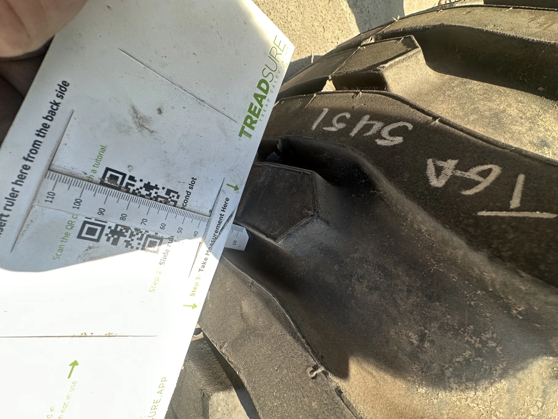 USED 12-16.5 Titan Trac Loader NHS C(6Ply) TL 95% on a 9.75 X 16.5 Silver Mist 6 Bolt Imp Wheel image 8