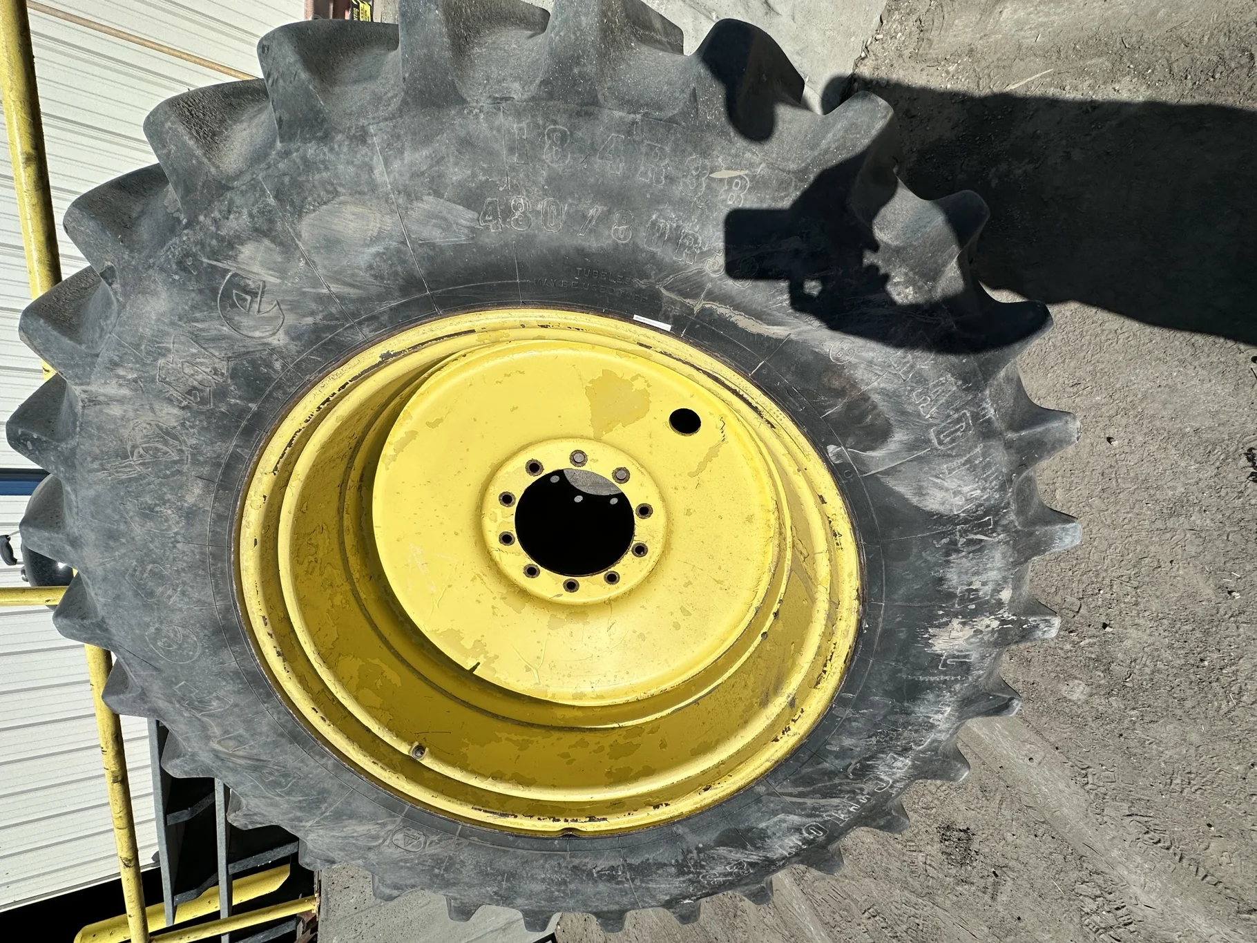Used 75% 650/65R38 Alliance 360 Super Power Drive Radial R-1W (171D) TL on a 18 x 38 JD Yellow
