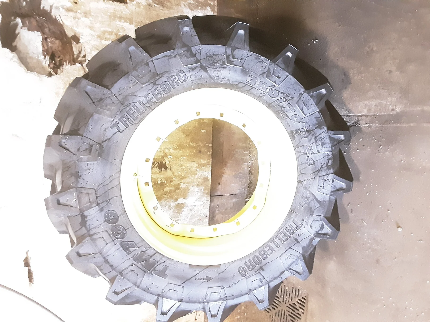 Take-Off 380/70R24 125A8 Trelleborg TM700 R-1W TL on a 12 X 24 2 Bolt JD Yellow Waffle Wheel image 2