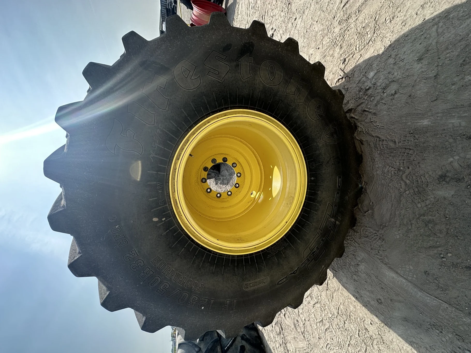 Used IF1250/50R32 CFO Firestone Radial Deep Tread 23 R-1W 195B TL 75% on 44 X 32 JD 10 Bolt 3 Piece image 2