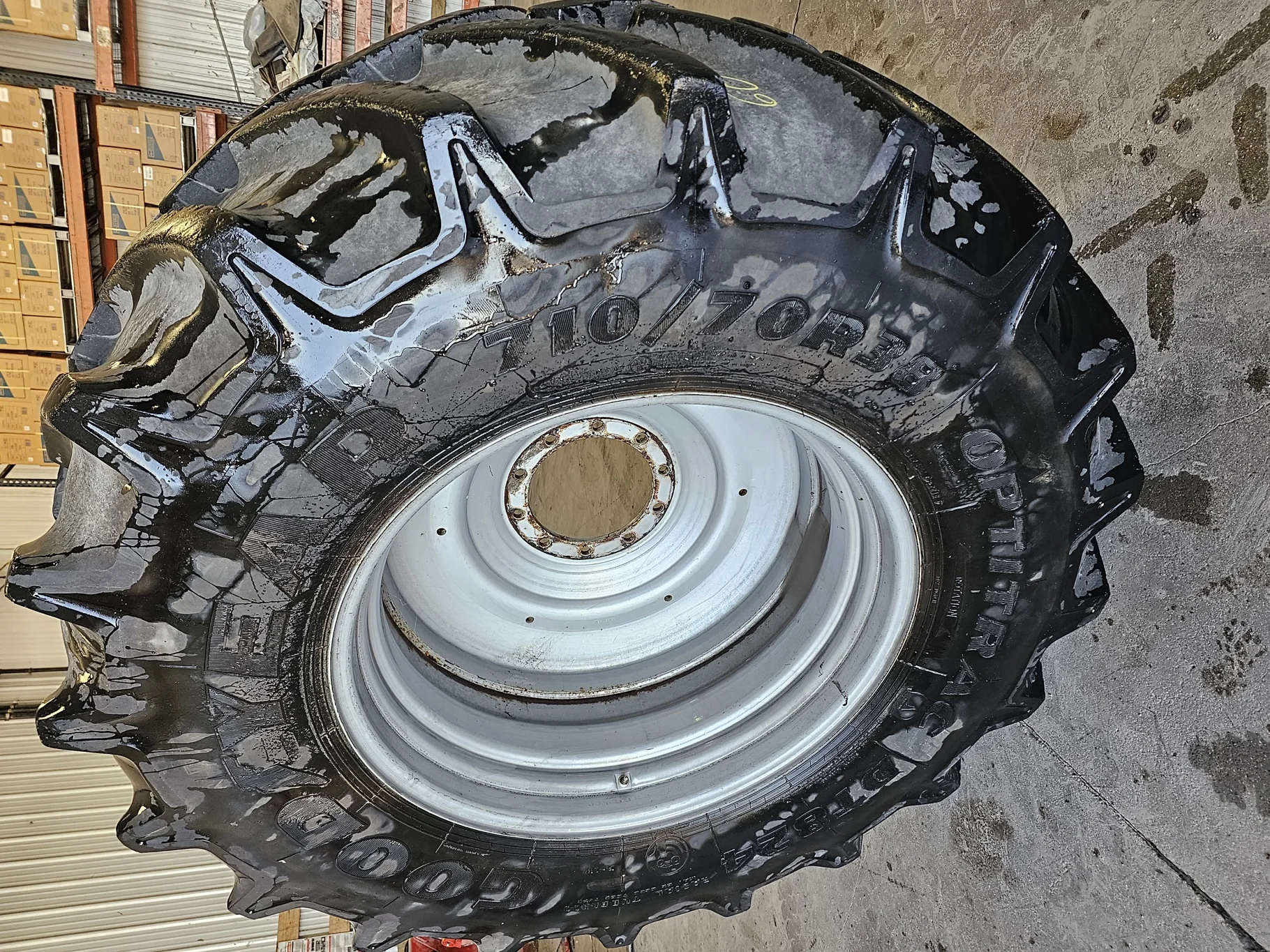 Used 710/70R38 166D Goodyear Optitrac R1W 85% on 23 x 38 CIH 10-13-11 Wheel - lug cuts