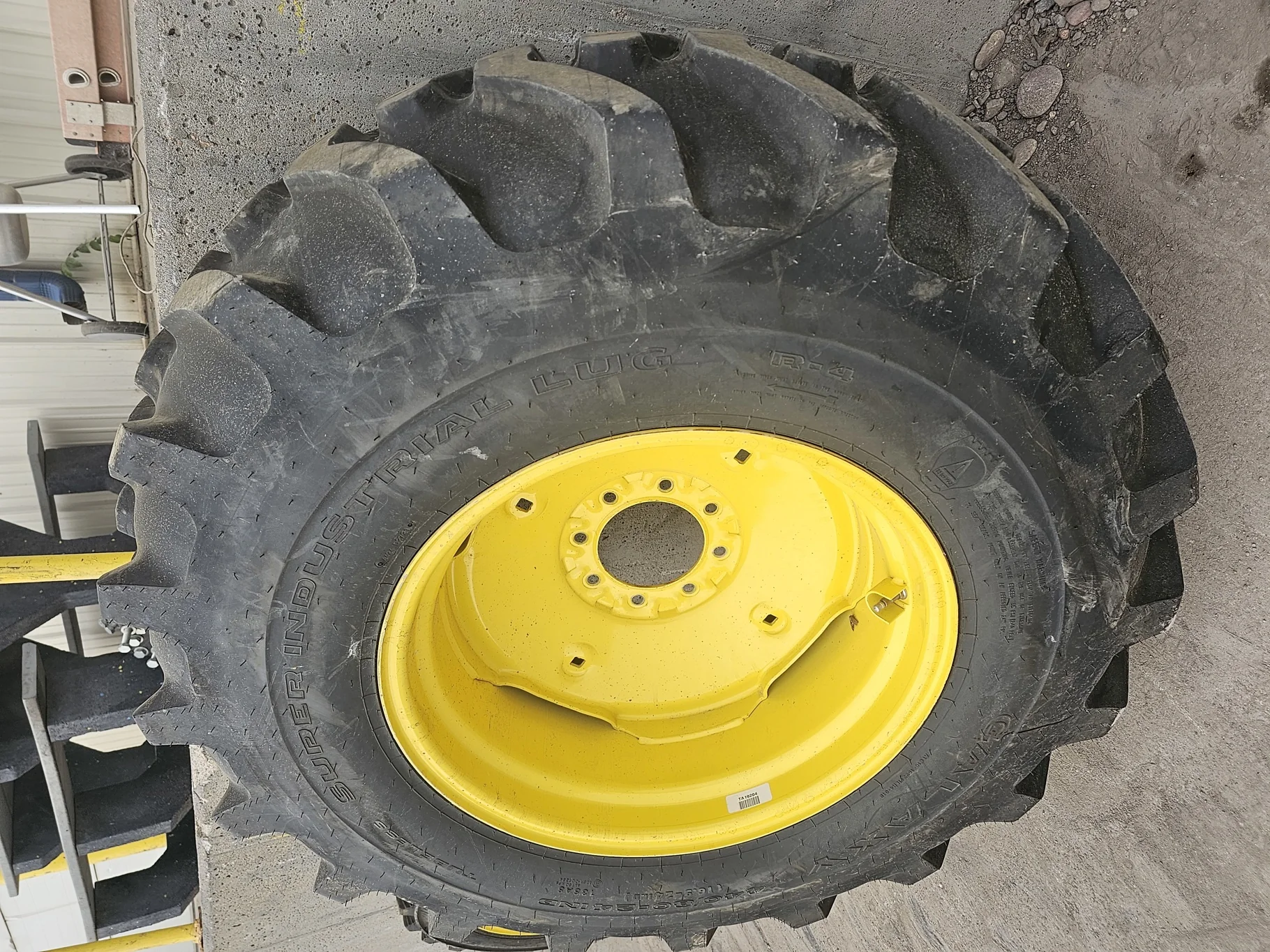 Used 440/80-24 (16.9-24) Galaxy Super Industrial Lug R-4 (8Ply) TL 95% on a 15 x 24 JD Yellow