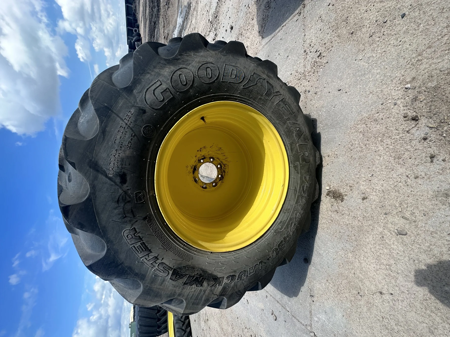 Used LSW 750/55R30 Goodyear Muck Master TL 85% on a 25 x 30 8-8-6 JD Yellow 8 Bolt Wheel image 2