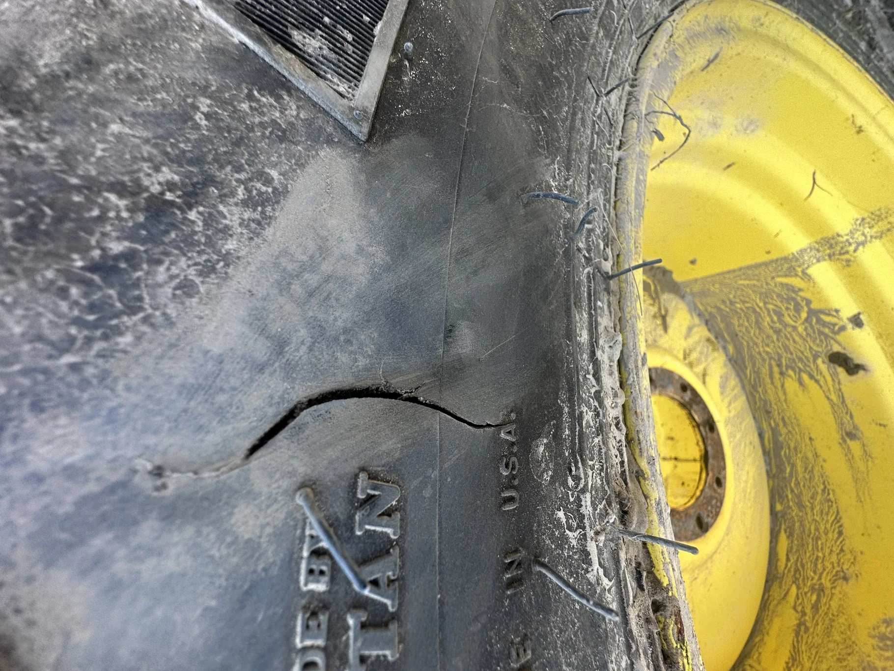 Used LSW 750/55R30 Goodyear Muck Master TL 85% on a 25 x 30 8-8-6 JD Yellow 8 Bolt Wheel image 6