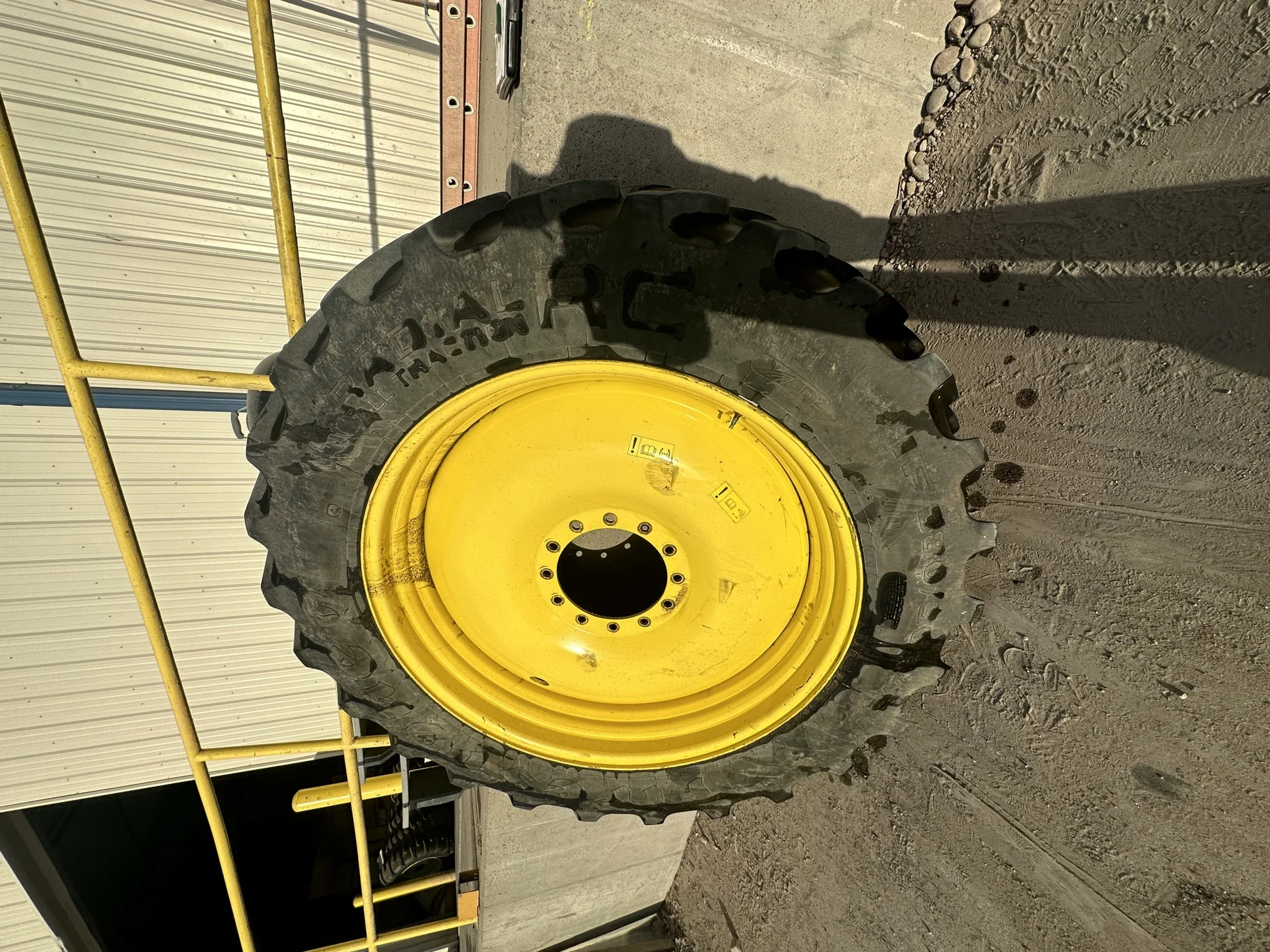 Used IF380/90R46 Firestone Radial 9000 R-1W 159B TL 75% on a 13 x 46 JD Yellow 12 Bolt Sprayer
