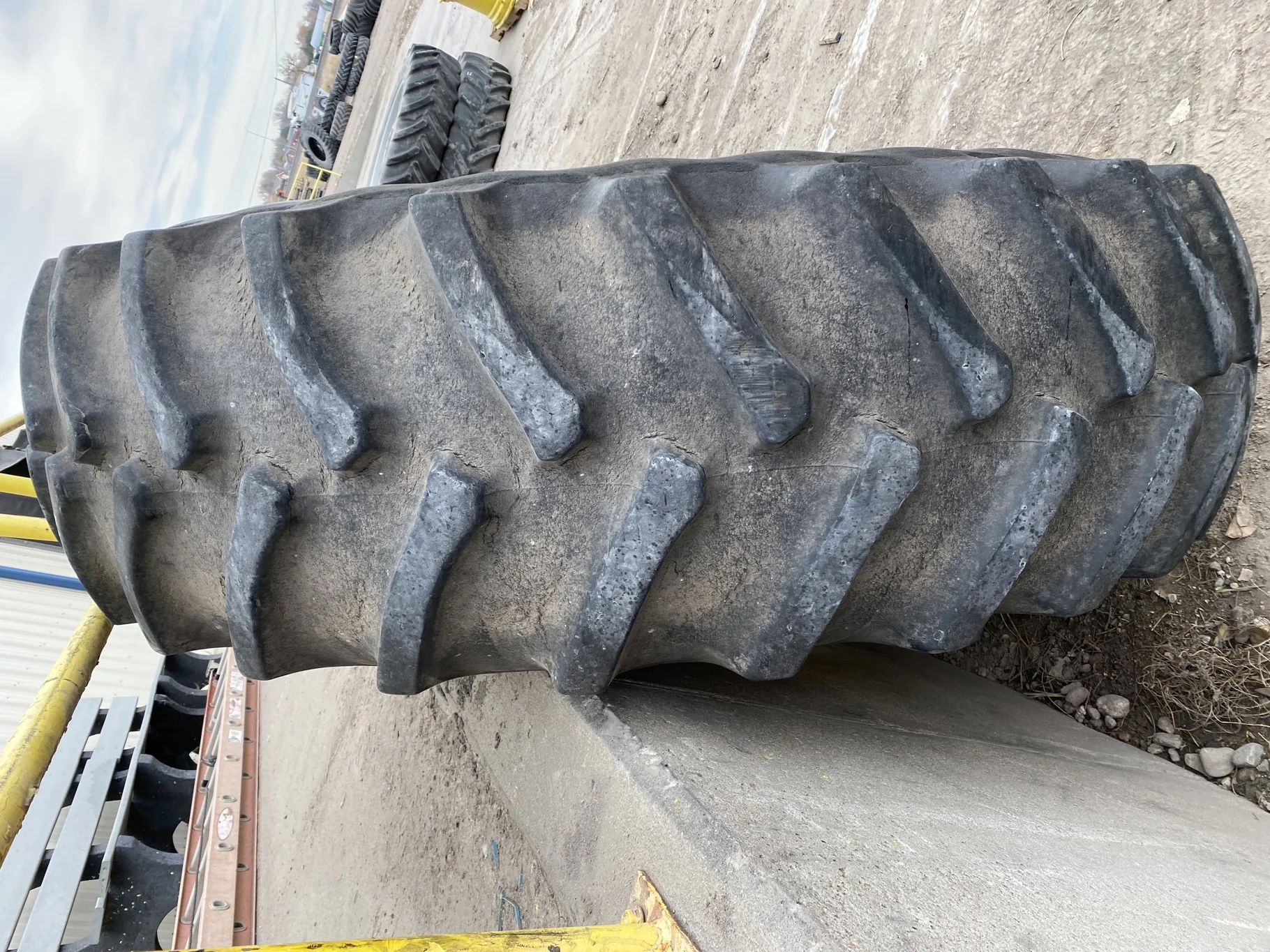 Used 520/85R42 Firestone Radial All Traction 23 R-1W 157B TL  75% on 18 x 42 JD Yellow 10 Bolt Dolly image 3