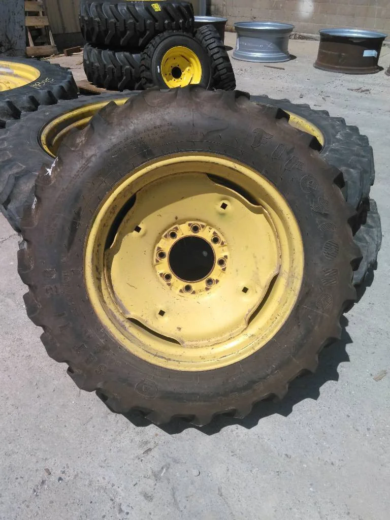 Used 11.2-24 113A3 Firestone Super All Traction ll TT R-1 65-70% On 10 x 24 8-8-6 JD Yellow Wheel