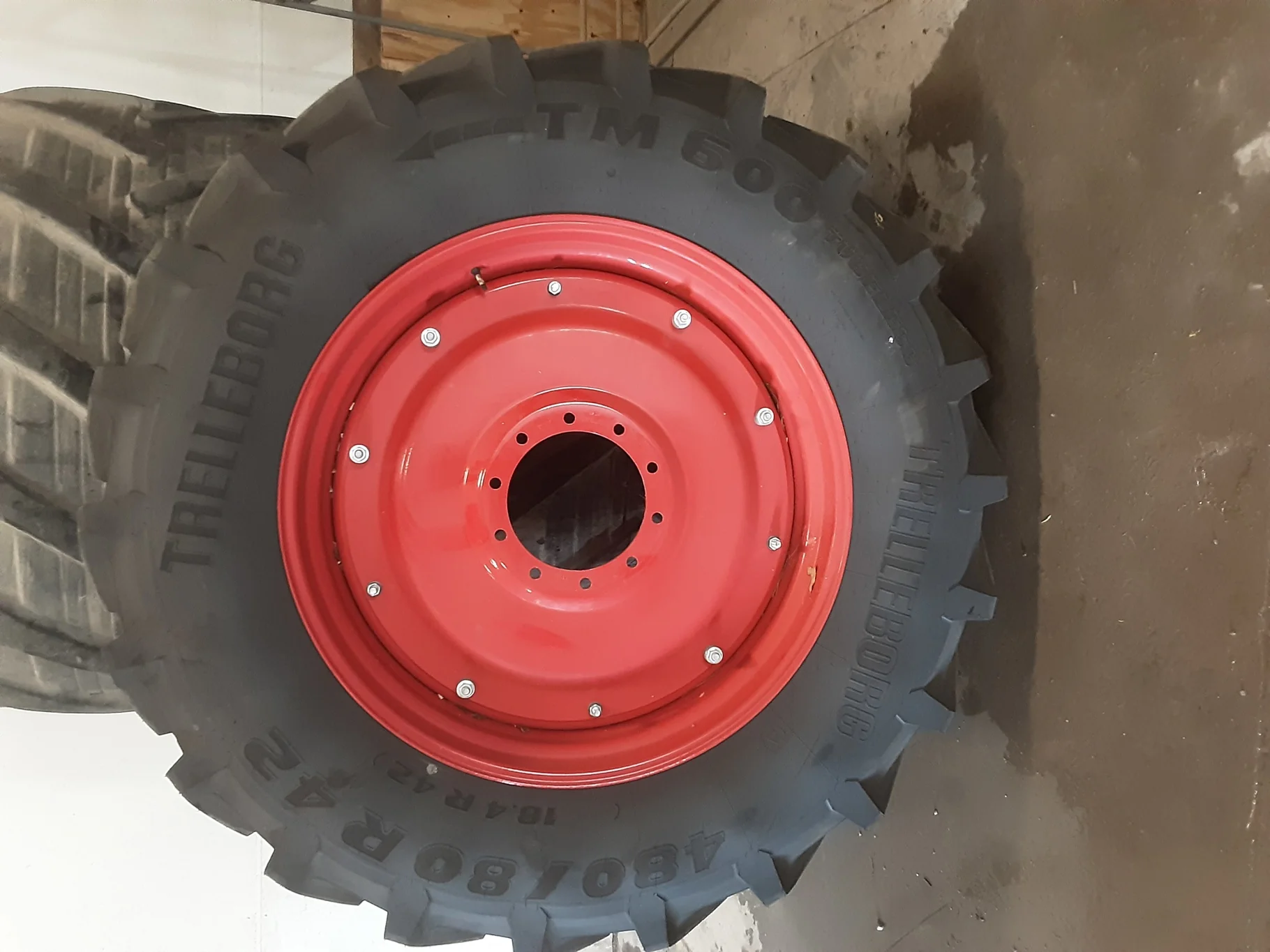 TAKE-OFF 480/80R42 Trelleborg TM600 R-1W 151A8 TL on a 16 X 42 Fendt Red 12 Bolt 2 Piece Dual Whe
