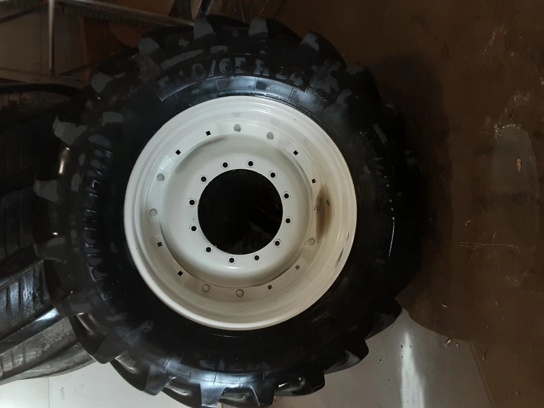 Used 540/65R34 Michelin MultiBib R-1W (145D) TL 95% on a 15 x 34 12-16.75-14.5 NH W Waffle
