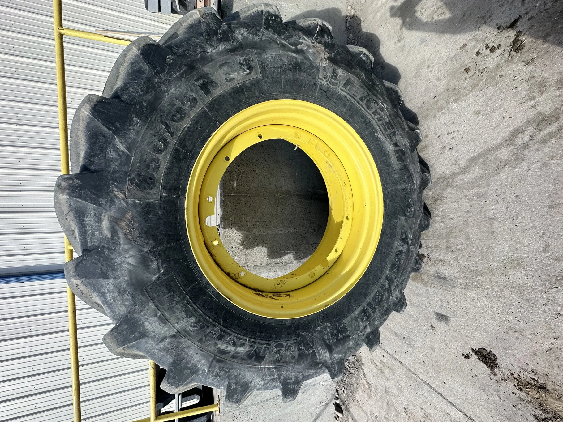 Used 650/65R38 Michelin MultiBib R-1W 157D TL 75% on a 18 x 38 JD Yellow 12 Bolt (.937) Stub D image 2